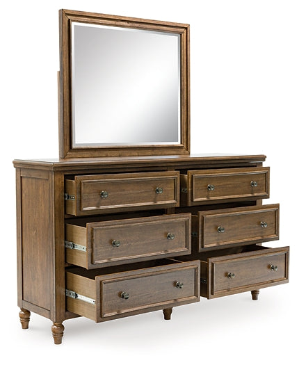 Sturlayne California King Upholstered Panel Bed with Mirrored Dresser, Chest and Nightstand
