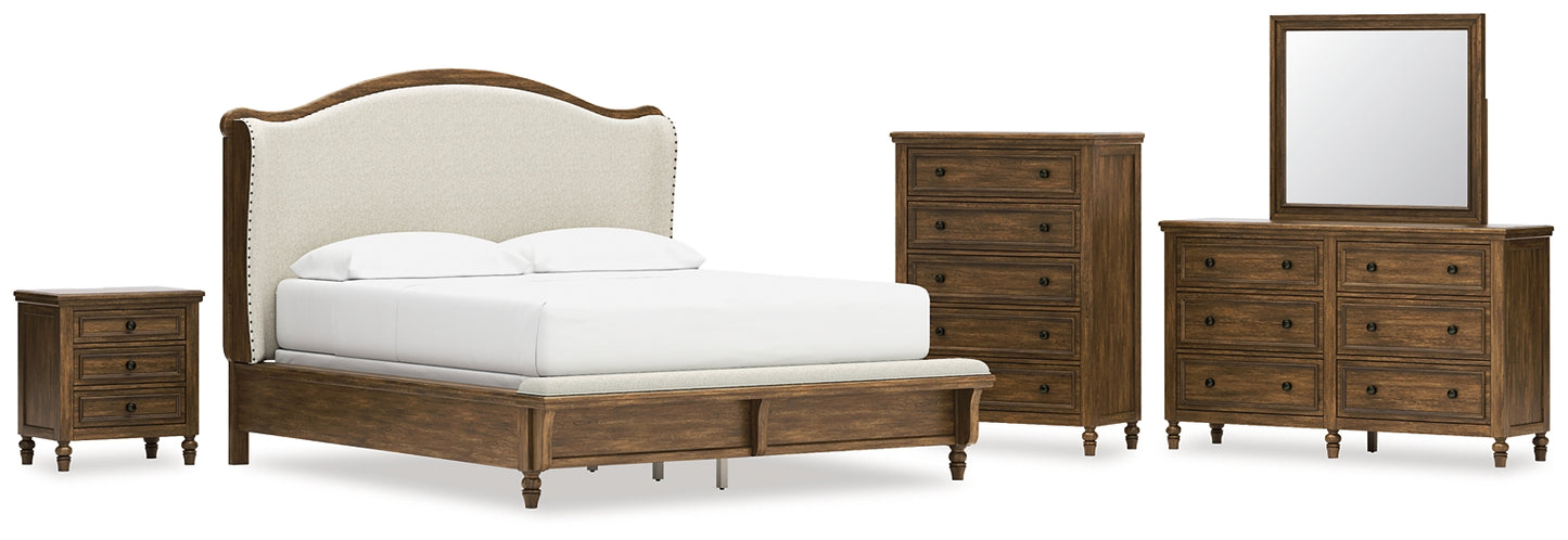 Sturlayne California King Upholstered Panel Bed with Mirrored Dresser, Chest and Nightstand