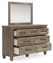 Load image into Gallery viewer, Yarbeck Queen Panel Bed with Storage with Mirrored Dresser and Chest
