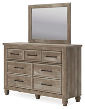Load image into Gallery viewer, Yarbeck Queen Panel Bed with Mirrored Dresser, Chest and Nightstand
