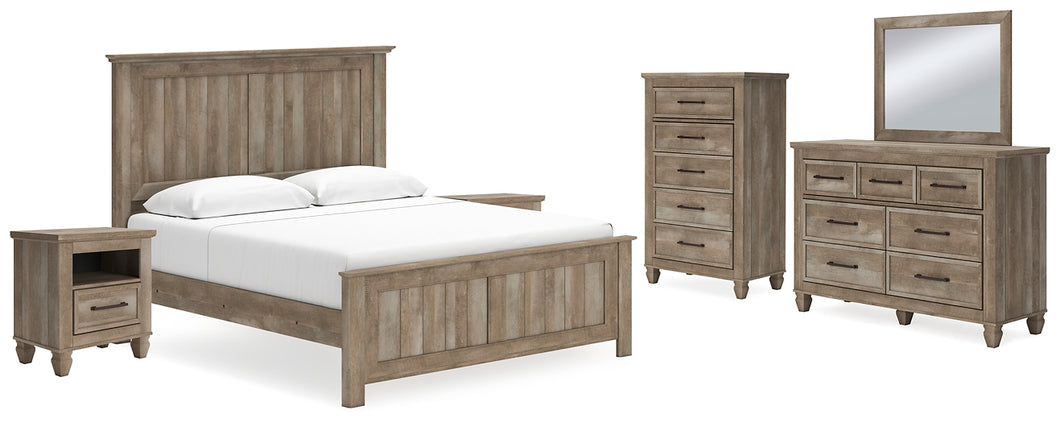 Yarbeck King Panel Bed with Mirrored Dresser, Chest and 2 Nightstands